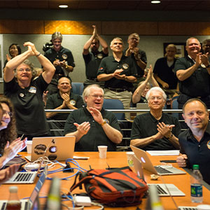 Part of the New Horizons team celebrating the spacecraft's flyby of Pluto.